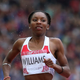 Bianca Williams, left of England looks to her left as she wins her semifinal of the women’s 200 meter race at Hampden Park Stadium during the Commonwealth Games 2014 in Glasgow, Scotland, Thursday July 31, 2014.
